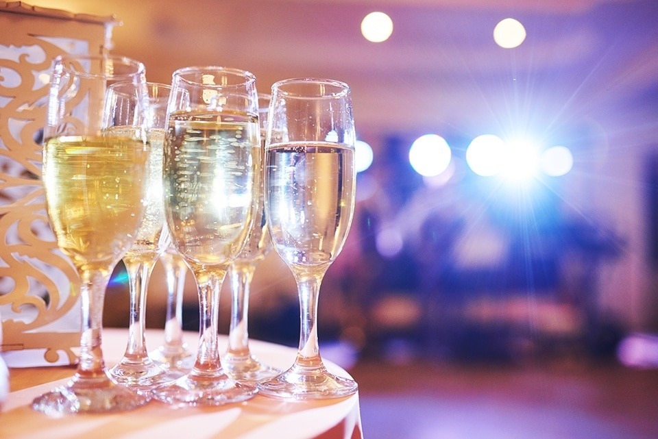 lot-wine-glasses-blue-light-with-cool-delicious-champagne-white-wine-bar